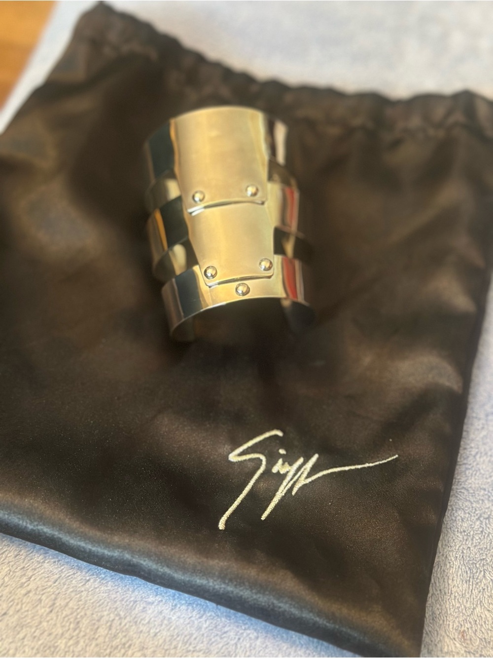Giuseppe Zanotti armor inspired wide metal cuff w/rivet accents